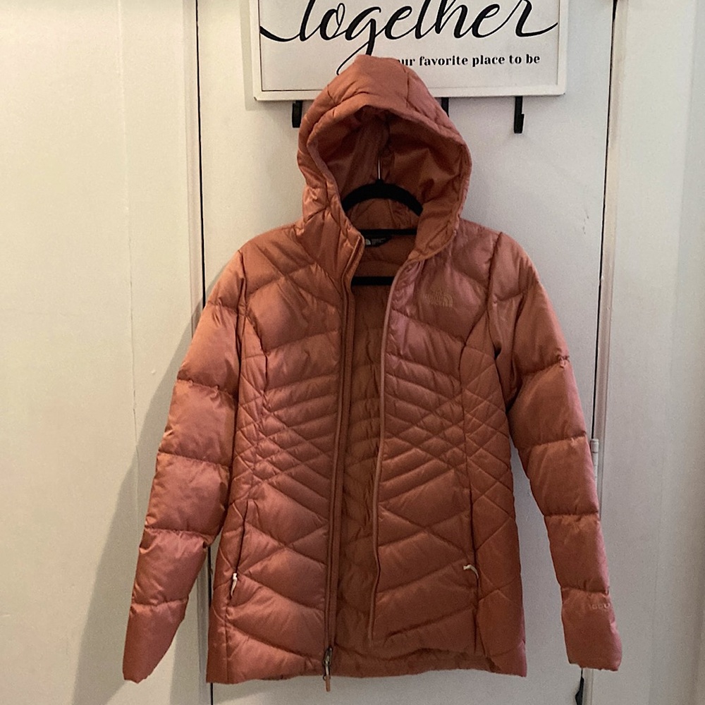 Great condition Northface jacket size small peachy color.